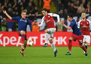 CSKA Moscow V Arsenal 2017-18 Prints: Ozil vs. Kuchaev: A Europa League Battle at the Heart of Midfield
