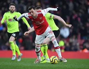 Arsenal V Sheffield United 2019-20 Prints: Ozil vs. Lundstram: A Battle of Midfield Masters in Arsenal vs
