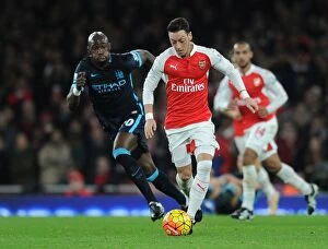 Arsenal v Manchester City 2015-16 Collection: Ozil vs Mangala: Clash of the Titans in Arsenal vs Manchester City (2015-16) Premier League