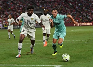 Arsenal V PSG Pre Season Friendly 2018-19 Prints: Ozil vs. Mbe Soh: Clash of the Stars in Arsenal vs. PSG ICC 2018
