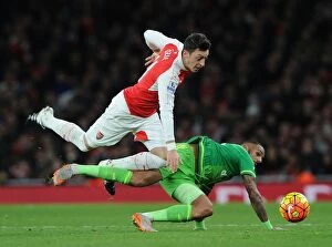 Images Dated 5th December 2015: Ozil vs M'Vila: Battle in the Arsenal vs Sunderland Premier League Clash