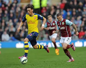 Burnley V Arsenal 2014/15 Prints: Ozil vs. Trippier: A Premier League Showdown at Turf Moor