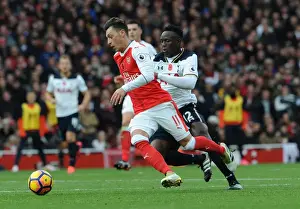 Arsenal V Tottenham Hotspur 2016-17 Prints: Ozil vs. Wanyama: A Premier League Showdown at the Emirates (2016-17)