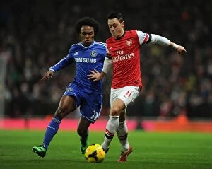 Images Dated 23rd December 2013: Ozil vs. Willian: A Football Rivalry Unfolds - Arsenal vs. Chelsea (2013-14)