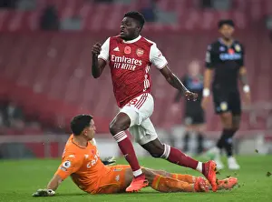 Arsenal V Aston Villa 2020-21 Prints: Partey vs Martinez: A Star-Studded Clash in Arsenal vs Aston Villa Premier League Showdown