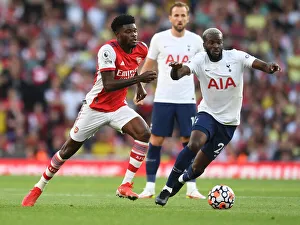 Arsenal V Tottenham Hotspur 2021-22 Prints: Partey vs. Ndombele: A Midfield Battle in the Arsenal vs. Tottenham Premier League Clash