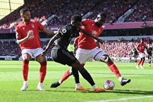 Images Dated 20th May 2023: Partey vs Niakhate: Intense Clash Between Nottingham Forest and Arsenal in Premier League