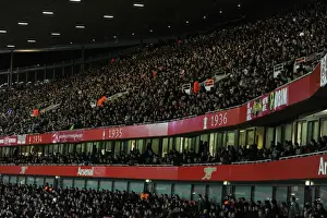 Passionate Arsenal Fans at Emirates Stadium: Arsenal vs AC Milan, UEFA Champions League