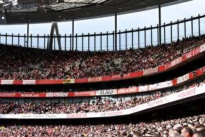 Arsenal v Chelsea 2021-22 Collection: Passionate Arsenal vs. Chelsea Clash: A Sea of Colors at Emirates Stadium - Arsenal v Chelsea