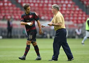 Pat Rice Arsenal Assistant Manager give Mathieu Flamini