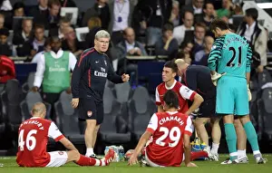 Pat Rice (Assistant Manager) talks to the players before the start of extra time