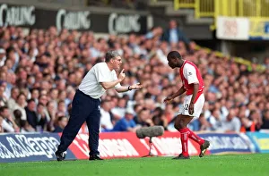 Pat Rice give Lauren instructions during the match. Tottenham Hotsour v Arsenal Pat Rice give Lauren instructions during the match. Tottenham Hotsour v Arsenal
