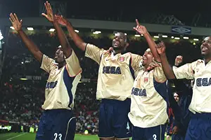Patrick Vieira, Ashley Cole, Lauren and Sol Campbell celebrate the Arsenal Championship victory afte