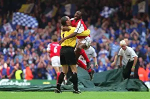 Patrick Vieira and David Seaman celebrate after the final whistle
