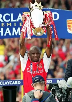 Arsenal v Everton Collection: Patrick Vieira lifts the Premiership trophy after the match