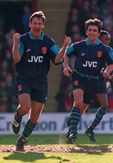 Paul Merson celebrates scoring a goal for Arsenal with Eddie McGoldrick
