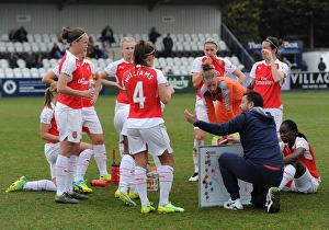 Pedro Martinez Losa the Arsenal Ladies Manager talks to the team before extra time
