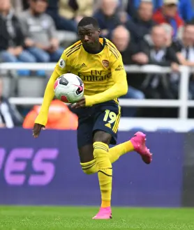 Newcastle United V Arsenal 2019-20 Prints: Pepe in Action: Arsenal's Star Winger Dazzles in Newcastle United Showdown