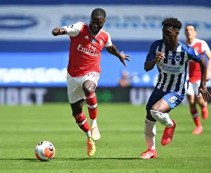 Brighton And Hove Albion V Arsenal 2019-20 Prints: Pepe Breaks Past Bissouma: Empty Stadium Showdown - Brighton vs