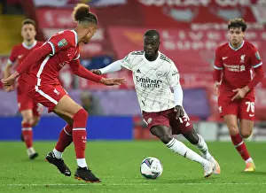 Liverpool V Arsenal - Carabao Cup 2020-21 Prints: Pepe Breaks Past Williams: Empty Anfield Rivals Liverpool and Arsenal in Carabao Cup Clash