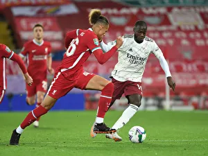 Liverpool V Arsenal - Carabao Cup 2020-21 Prints: Pepe Breaks Past Williams: Liverpool vs. Arsenal in Carabao Cup