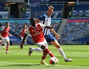 Brighton And Hove Albion V Arsenal 2019-20 Prints: Pepe vs Burn: Empty Stadium Showdown - Brighton & Hove Albion vs Arsenal FC