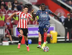 Brentford V Arsenal 2021-22 Prints: Pepe vs Canos: Battle in the Premier League - Brentford vs Arsenal (2021-22)