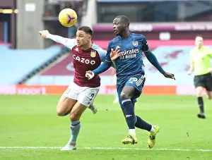Pepe vs. Cash: Premier League Rivalry at Empty Villa Park Amidst COVID-19 Restrictions - Arsenal vs. Aston Villa (February 2021)