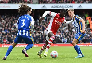 Pepe vs. Cucurella and Trossard: A Premier League Battle at the Emirates (April 2022)