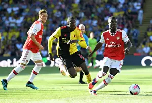 Pepe vs Doucoure: Intense Moment from Watford vs Arsenal Premier League Clash