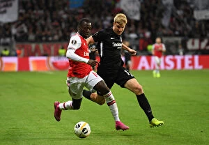 Eintracht Frankfurt v Arsenal 2019-20 Collection: Pepe vs. Hinteregger: Clash in the Europa League - Eintracht Frankfurt vs. Arsenal FC
