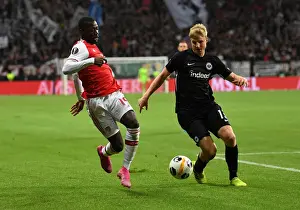 Eintracht Frankfurt V Arsenal 2019-20 Prints: Pepe vs Hinteregger: A Europa League Showdown - Arsenal vs Eintracht Frankfurt (2019-20)