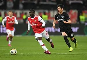 Eintracht Frankfurt V Arsenal 2019-20 Prints: Pepe vs Kamada: Clash in the Europa League - Eintracht Frankfurt vs Arsenal FC (Group F)