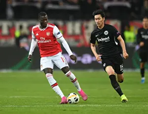 Eintracht Frankfurt V Arsenal 2019-20 Prints: Pepe vs Kamada: Clash of Wings in Europa League's Group F - Arsenal vs Eintracht Frankfurt