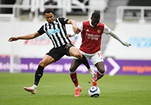 Newcastle United V Arsenal 2020-21 Prints: Pepe vs Murphy: Arsenal's Battle at Empty St