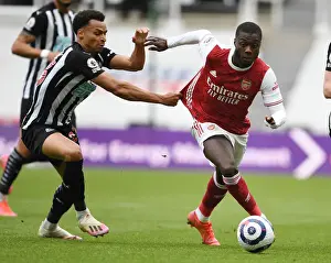 Newcastle United V Arsenal 2020-21 Prints: Pepe vs Murphy: Battle at St. James Park - Arsenal vs Newcastle United