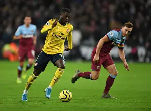 Pepe vs Noble: A Premier League Showdown - Arsenal's Pepe Clashes with West Ham's Noble (December 2019)
