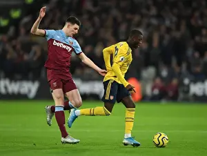 Pepe vs Rice: A Premier League Battle - Arsenal's Nicolas Pepe Takes on West Ham's Declan Rice (December 2019)