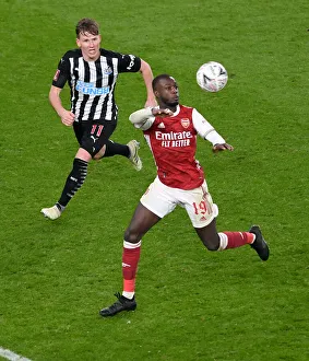 Pepe vs Ritchie: A FA Cup Battle at Arsenal