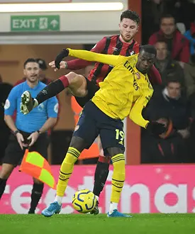Pepe vs Simpson: A Premier League Showdown - Arsenal's Nicolas Pepe Faces Off Against Bournemouth's Jack Simpson