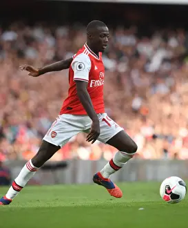 Arsenal V Tottenham Hotspur 2019-20 Prints: Pepe vs. Tottenham: Intense Head-to-Head Clash in Arsenal's Premier League Showdown