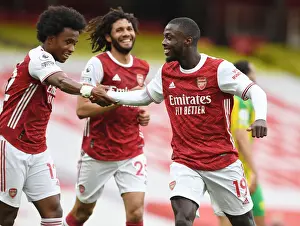 Pepe and Willian Celebrate Arsenal's Victory over West Bromwich Albion (2021)