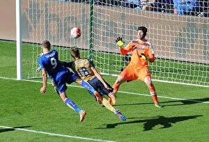 Images Dated 26th September 2015: Petr Cech (Arsenal) watches as Jamie Vardy (Leicester) hits the post. Leicester City 2