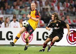 Images Dated 9th August 2008: Philippe Senderos (Arsenal) Diego Trinidad (Seville)