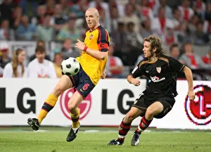 Arsenal V Seville Prints: Philippe Senderos (Arsenal) Diego Trinidad (Seville)