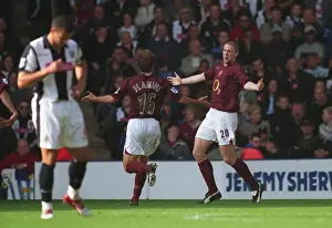 Philippe Senderos celebrates scoring a goal for Arsenal with Mathieu Flamini