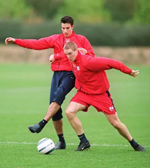 Philippe Senderos and Robin van Persie (Arsenal). Arsenal Training Session Philippe Senderos and Robin van Persie (Arsenal). Arsenal Training Session
