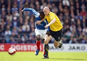Images Dated 15th May 2007: Phillipe Senderos (Arsenal) Benjani (Portsmouth)