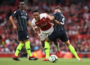 Images Dated 12th August 2018: Pierre-Emerick Aubameyang (Arsenal) John Stones (Man City). Arsenal 0: 2 Manchester City