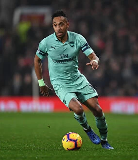 Manchester United v Arsenal 2018-19 Collection: Pierre-Emerick Aubameyang Faces Manchester United in Premier League Showdown (2018-19)